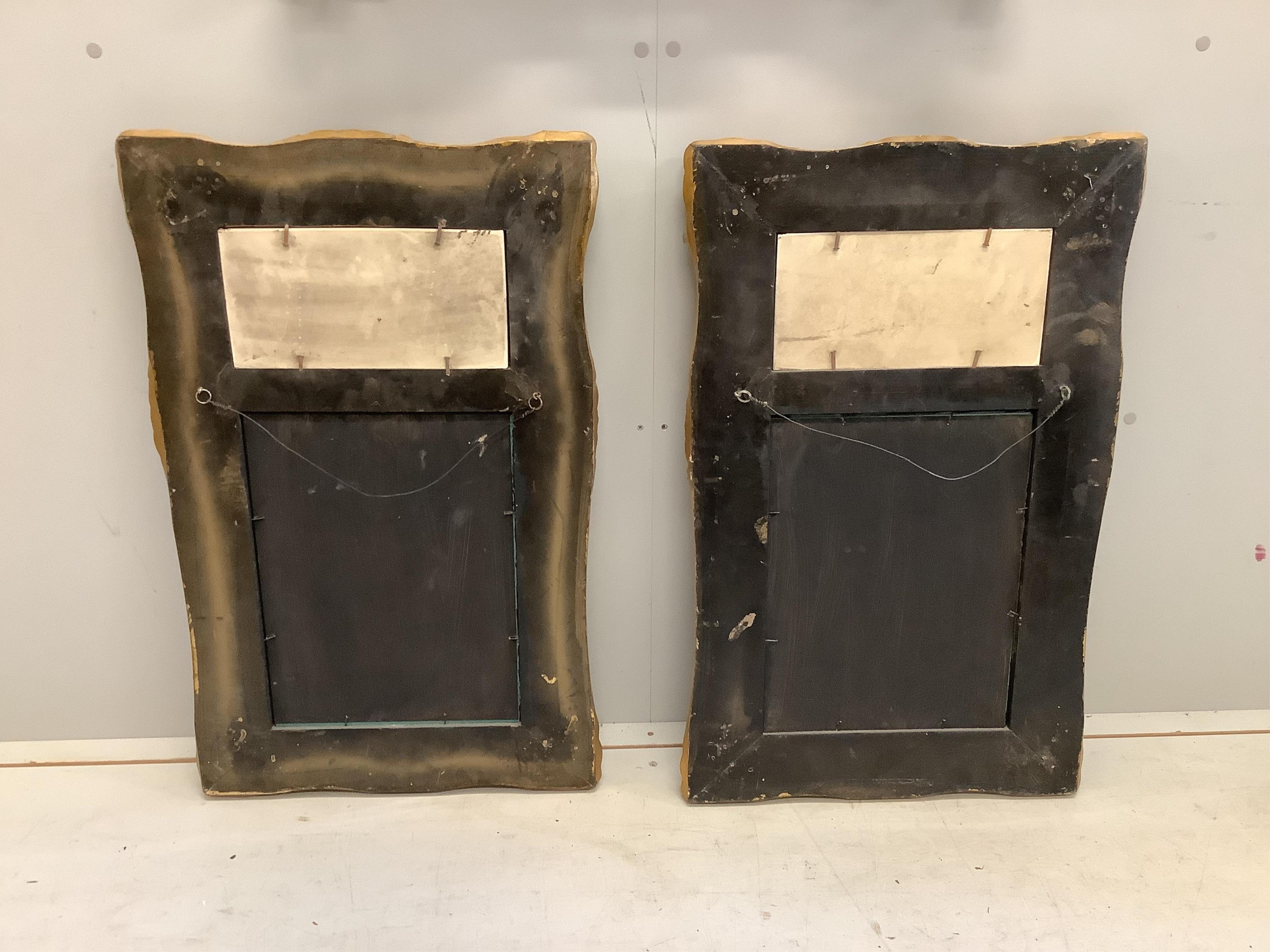 A pair of Victorian style gilt composition and faux marble wall mirrors, width 51cm, height 82cm, together with a similar larger mirror, width 77cm, height 87cm